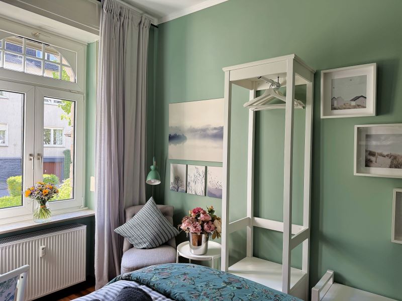 Schlafzimmer mit Doppelbett in Ferienwohnung Miss Sophie